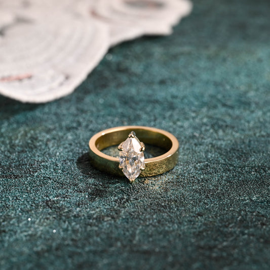 marquise-cut-lab-grown-diamond-engagement-ring-off-center-wedding-ring