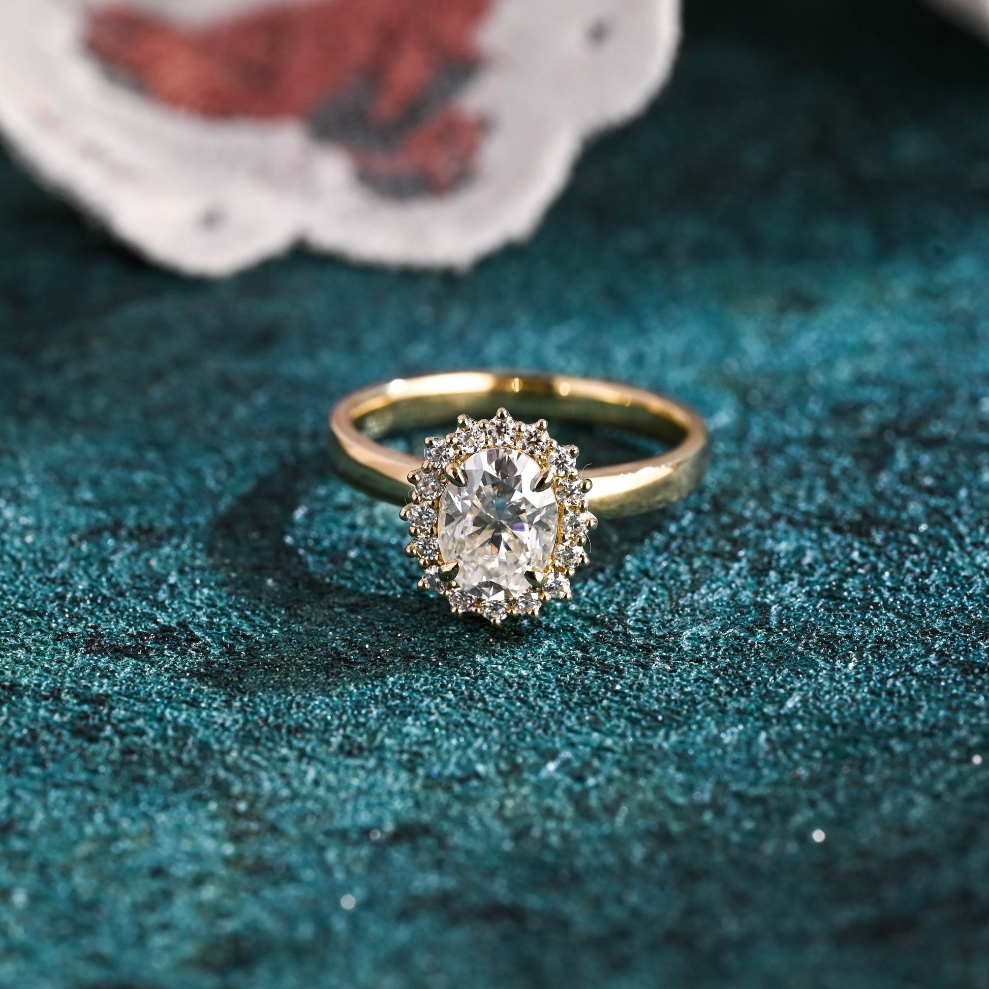 oval-cut-lab-diamond-engagement-ring-starburst-wedding-ring