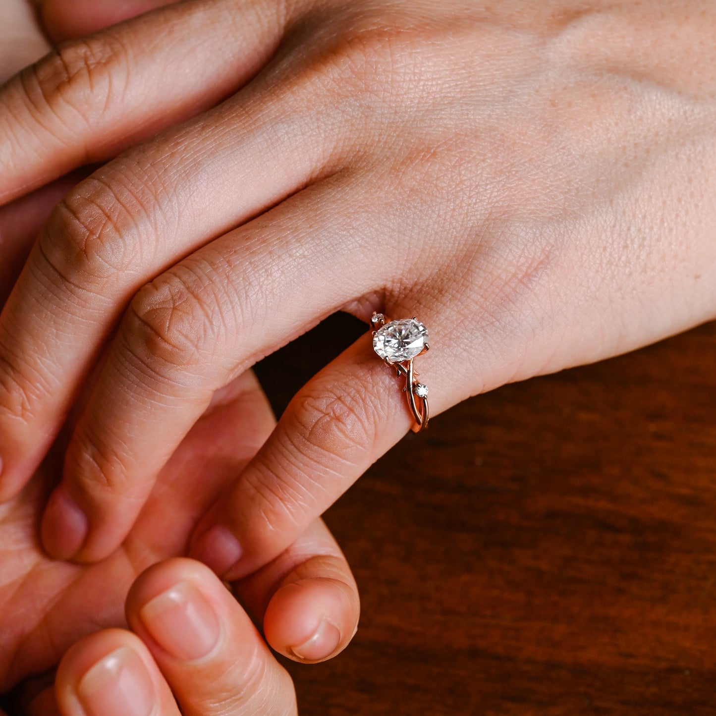 oval-cut-moissanite-ring-twist-band-leaf-ring