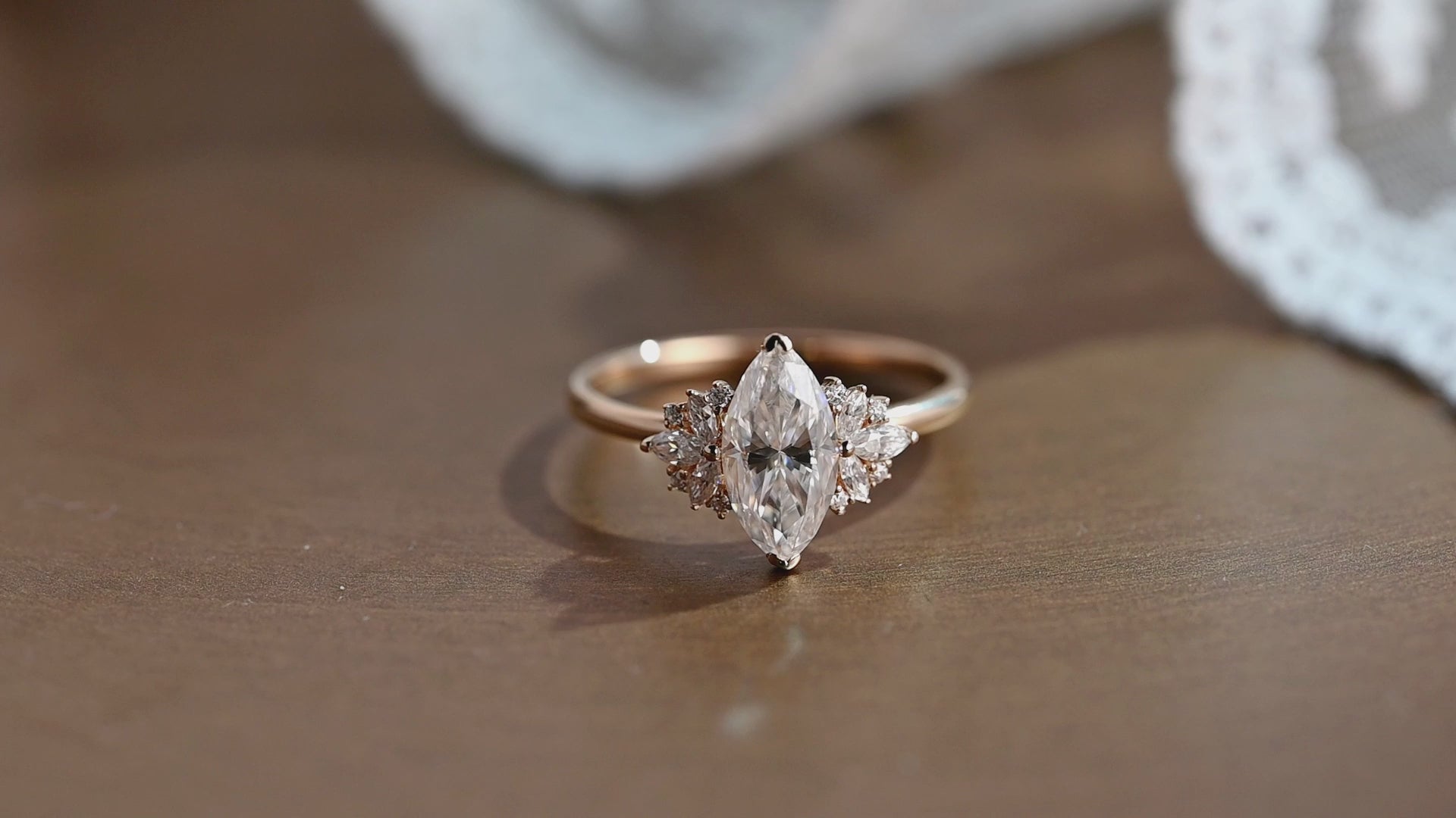 solid-gold-marquise-cut-moissanite-engagement-ring-cluster-ring