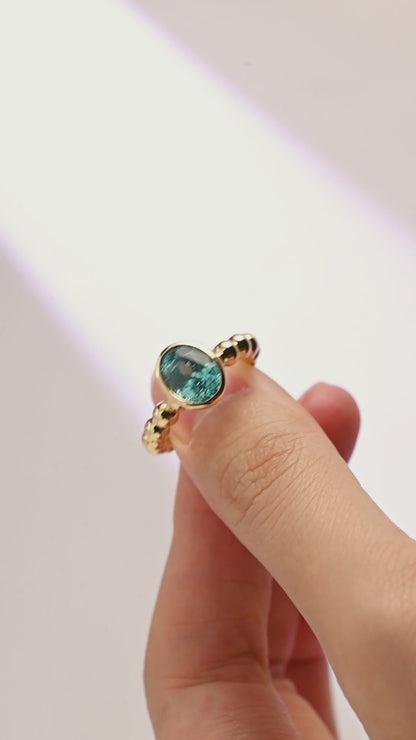 Solid Gold Beaded Oval Blue Topaz Engagement Ring