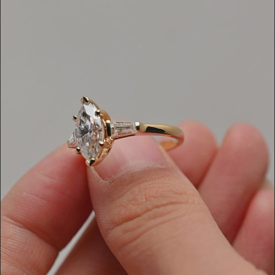 Solid-gold-three-stone-ring-marquise-cut-moissanite-engagement-ring