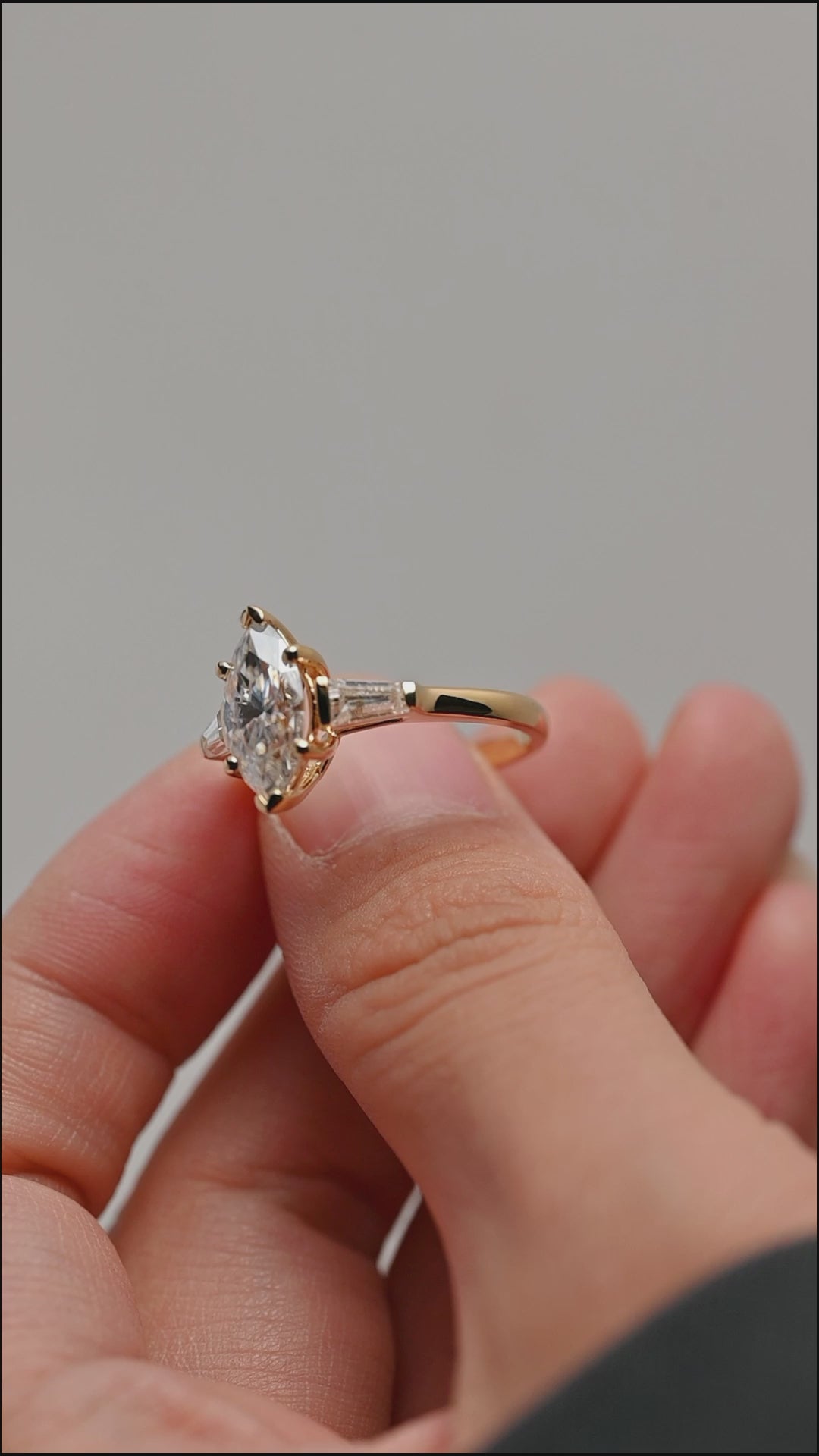 Solid-gold-three-stone-ring-marquise-cut-moissanite-engagement-ring