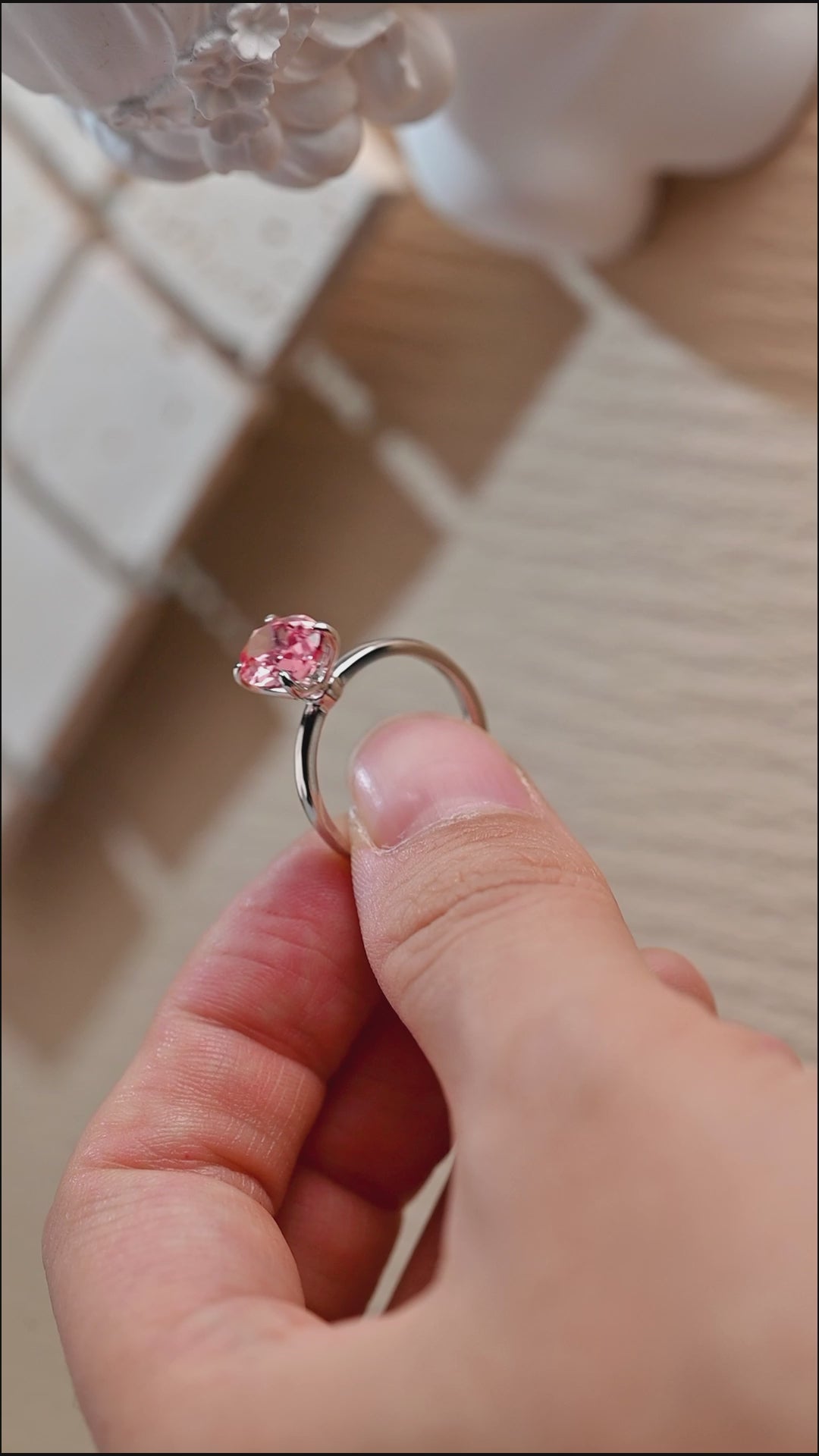 oval-cut-lab-grown-pink-sapphire-engagement-ring