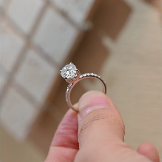 half-pave-oval-moissanite-engagement-ring