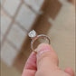 half-pave-oval-moissanite-engagement-ring