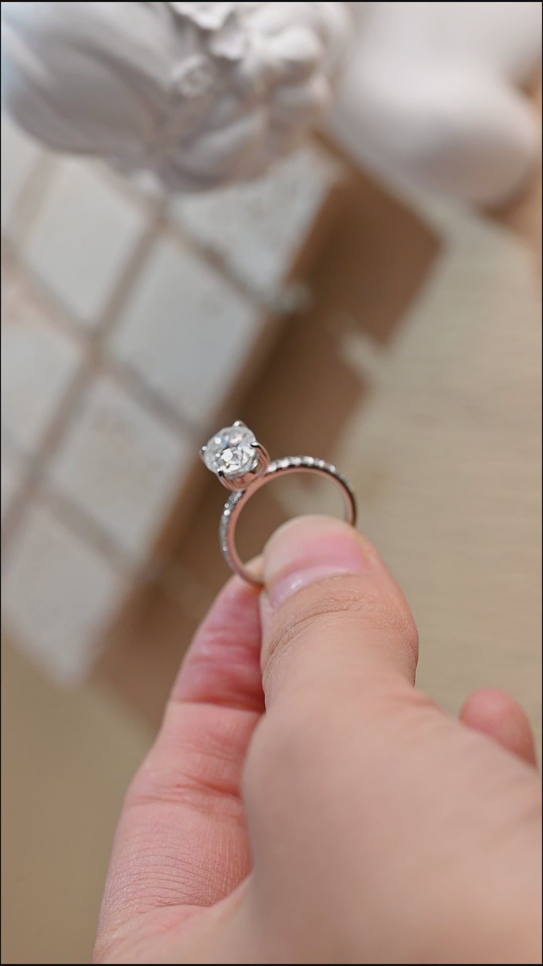 half-pave-oval-moissanite-engagement-ring