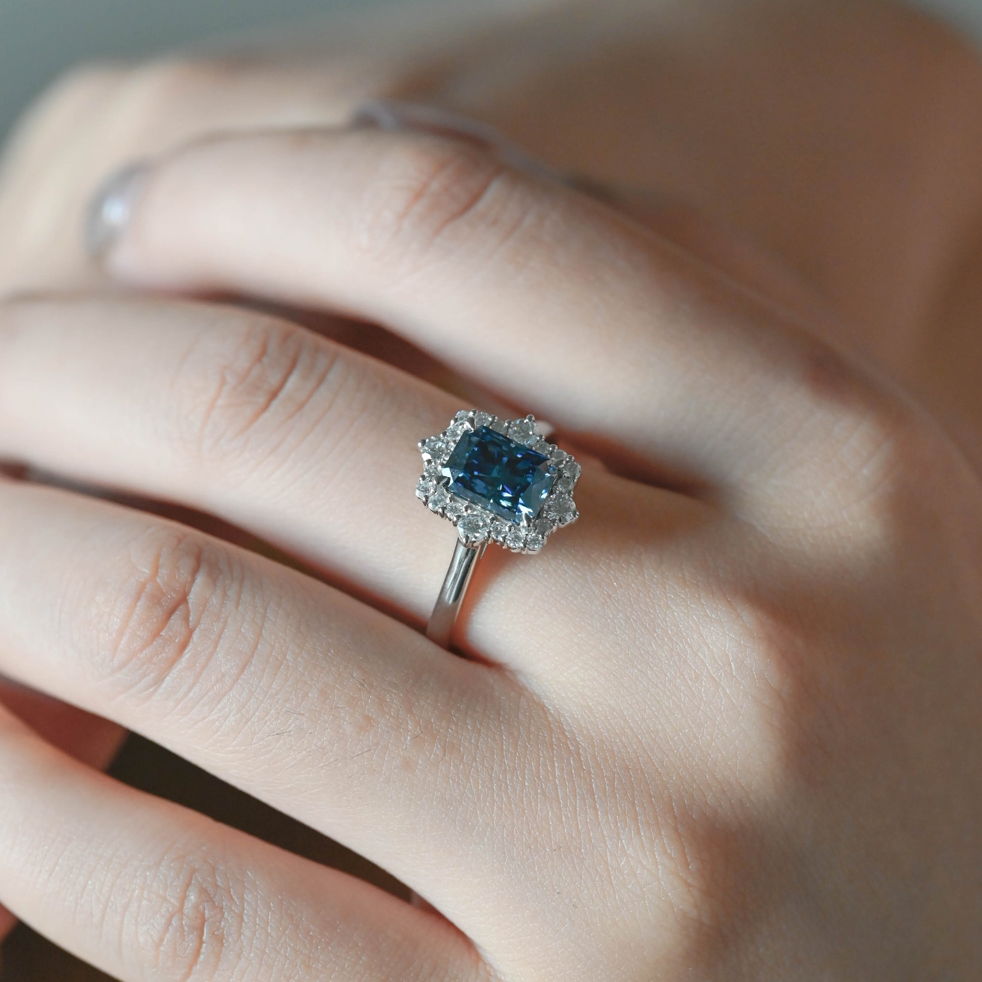 radiant-cut-moissanite-engagement-ring-blue-stone-wedding-ring