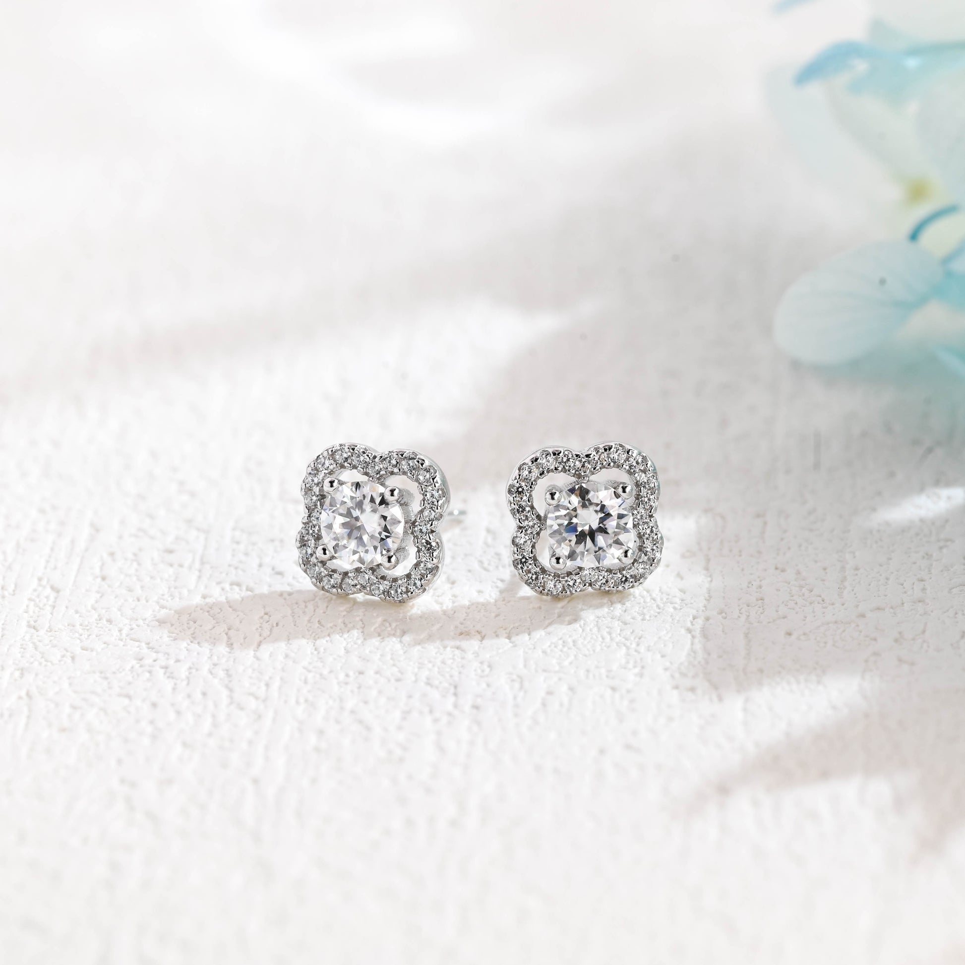 round-cut-moissanite-earrings-clover-inspired-studs