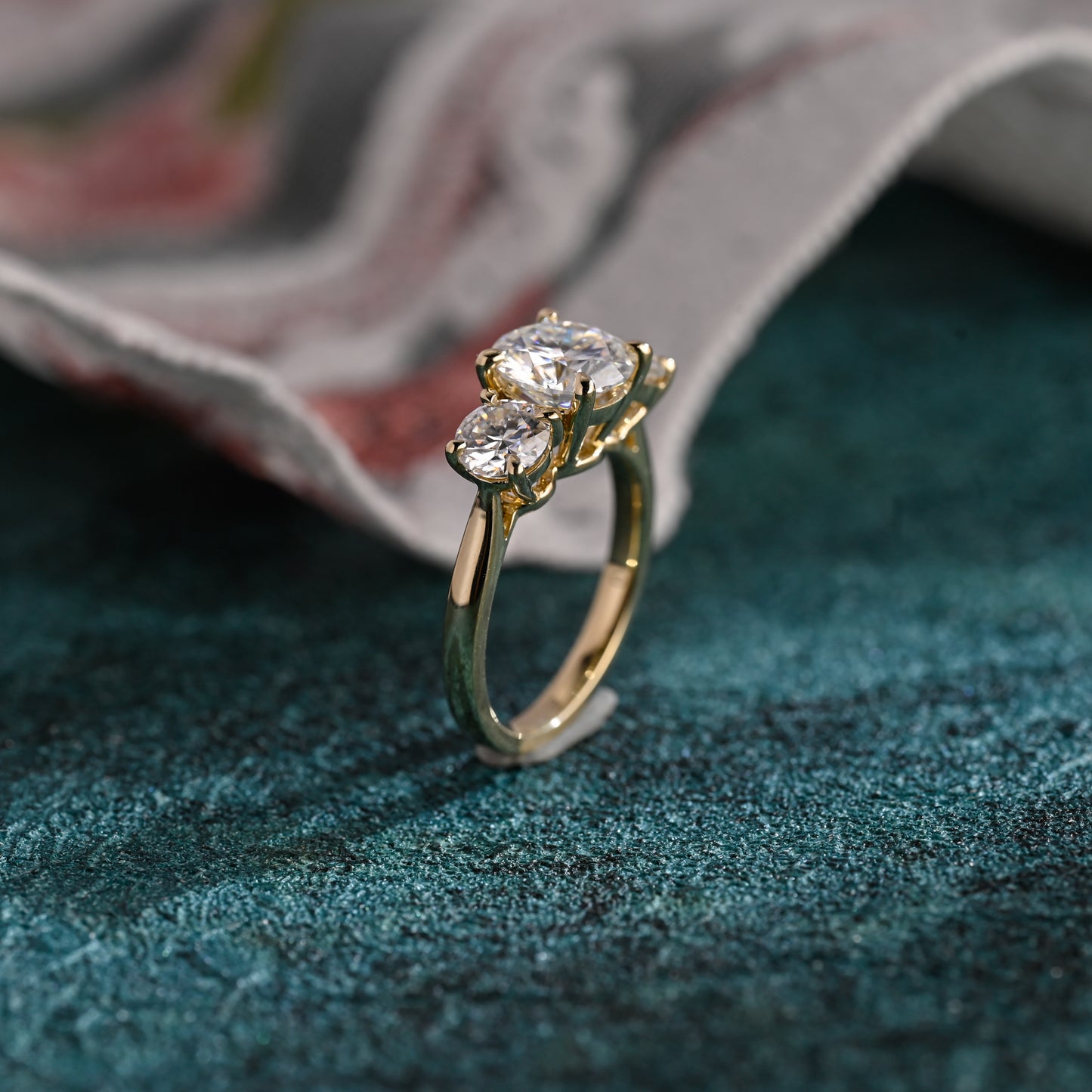 round-cut-lab-grown-diamond-ring-three-stone-engagement-ring